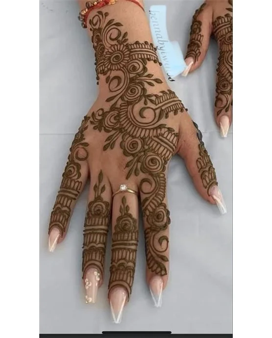 Curves Crown Motif Using Back Hand Mehndi Design